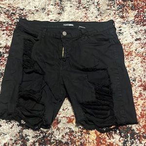 Black distressed shorts